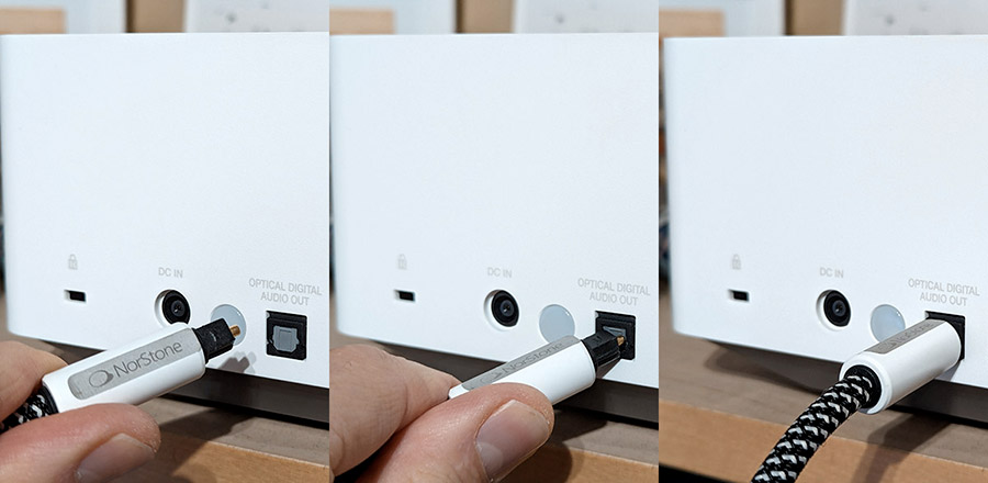 Connexion d'un câble audio numérique optique Toslink sur la sortie audio numérique optique d'un vidéoprojecteur Connexion d'un câble audio numérique optique Toslink sur la sortie audio numérique optique d'un vidéoprojecteur